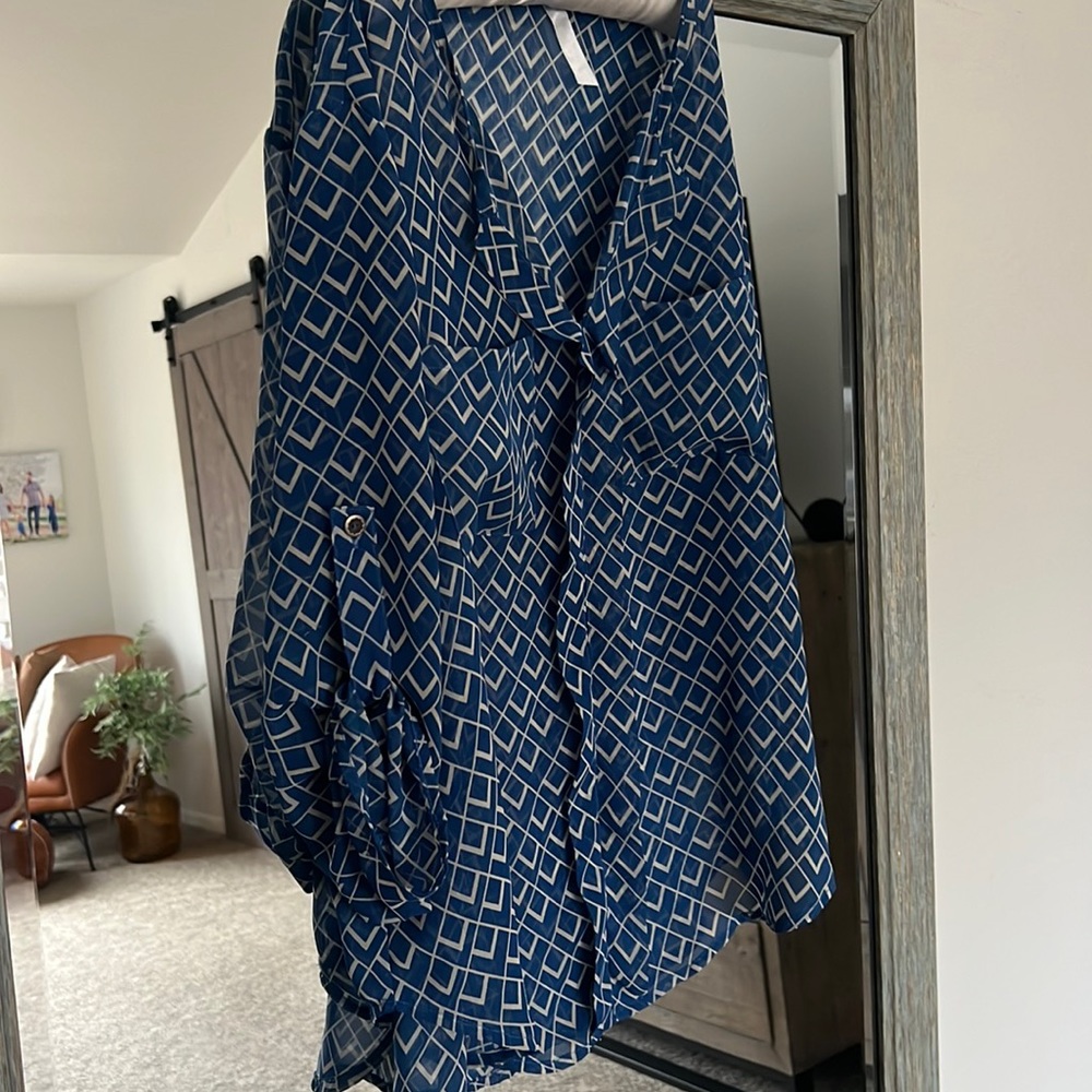 Barely worn, share blue blouse with white pattern